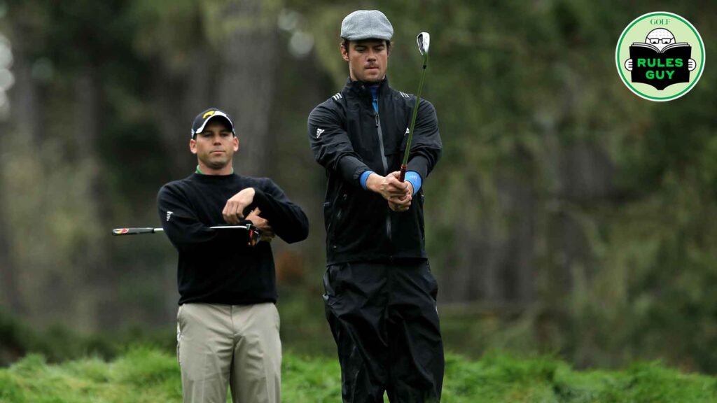 rules-guy:-can-partners-stand-directly-behind-each-other-when-one-is-hitting?